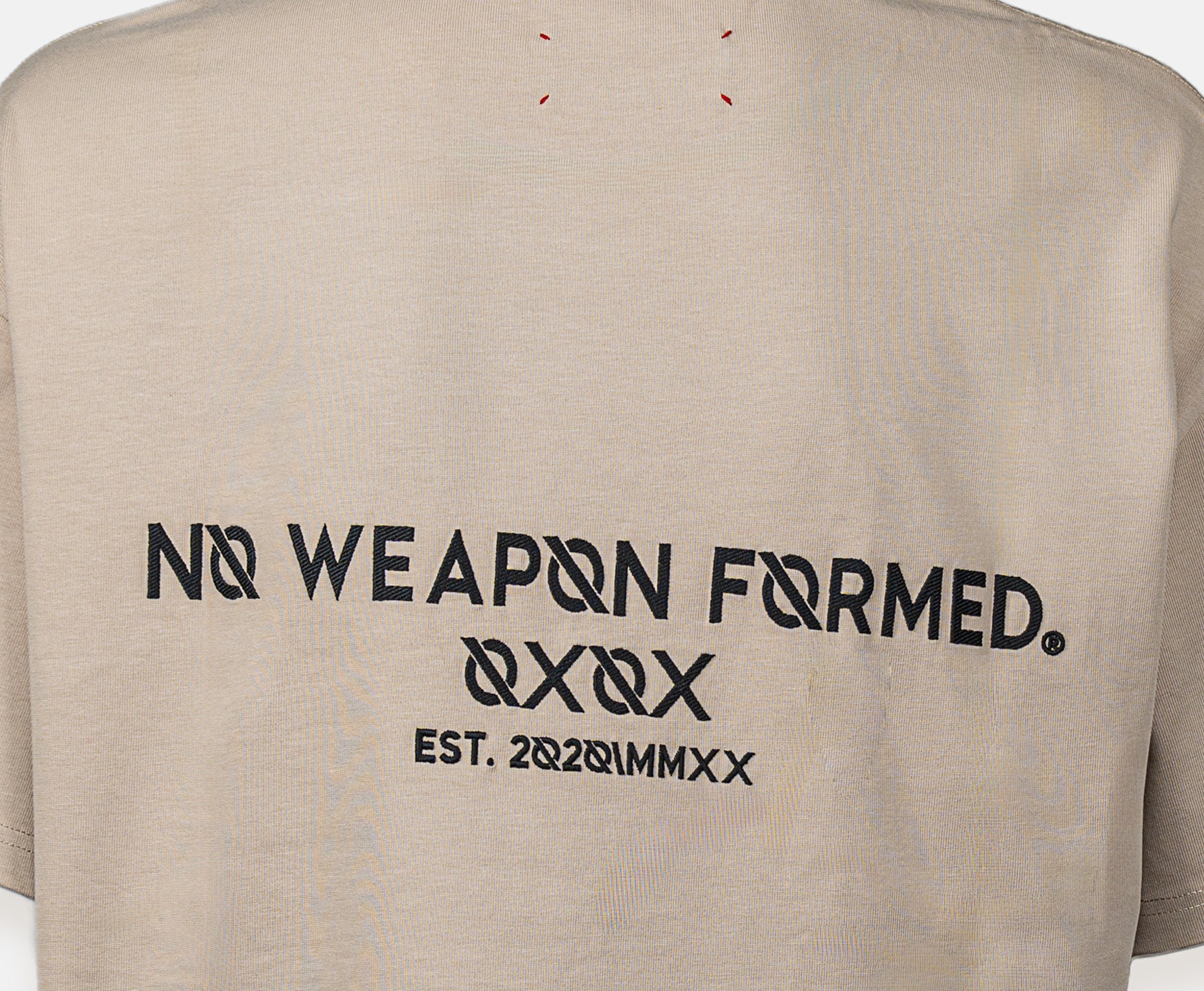 Embroidered Logo Over Size Tee – No Weapon Formed Collection