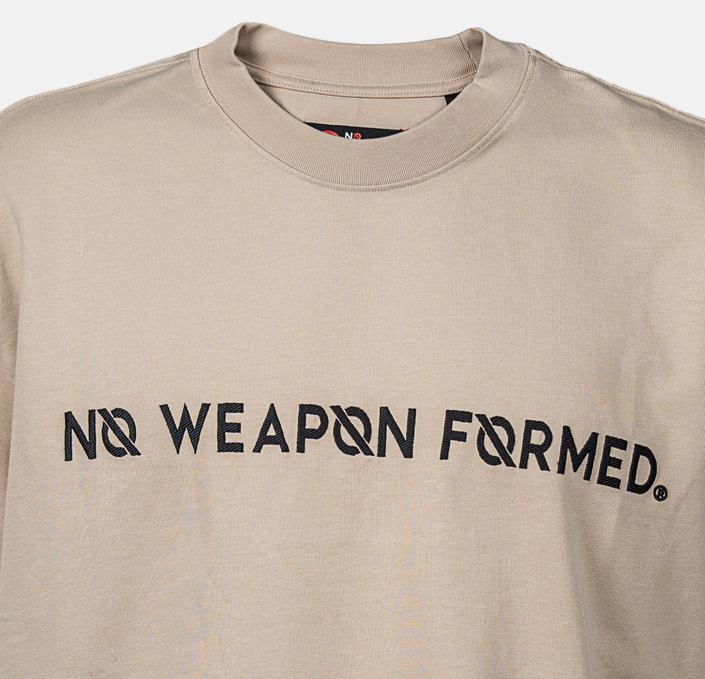 Embroidered Logo Over Size Tee – No Weapon Formed Collection